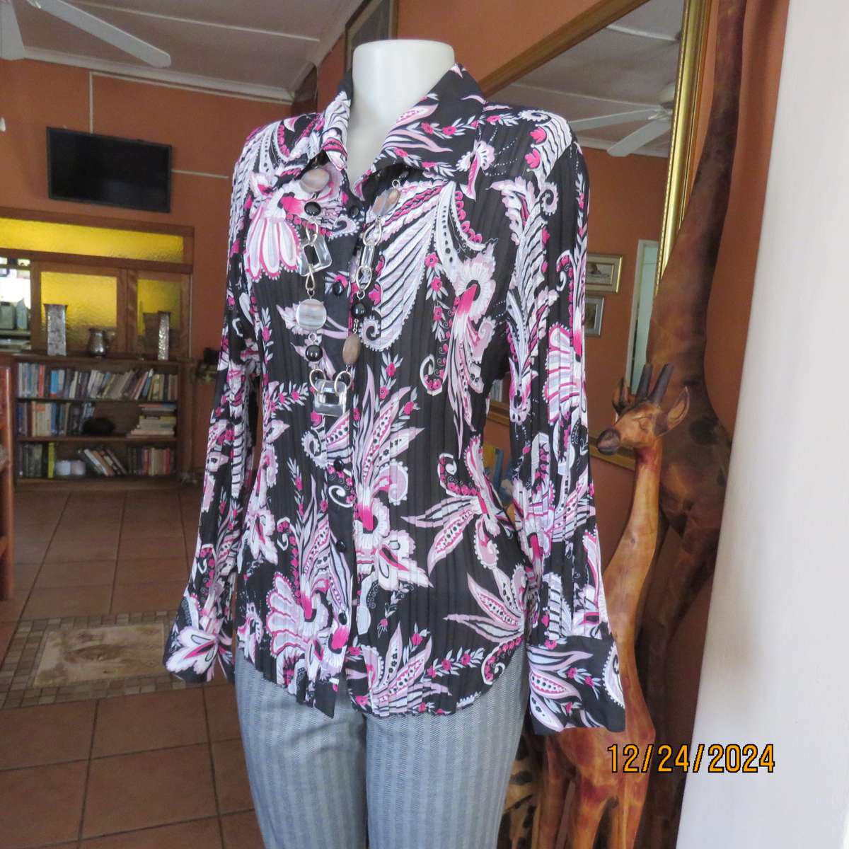 Permanent pleated black/pink/white bo-ho patterned button down long sleeve top. Size 40. Sheer poly.