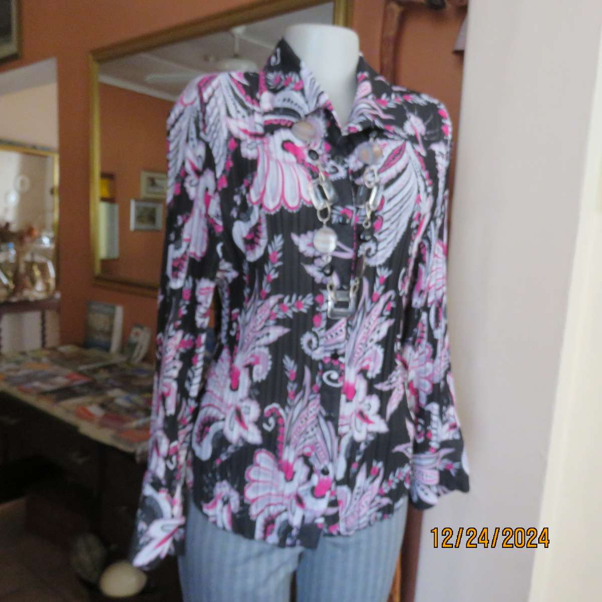 Permanent pleated black/pink/white bo-ho patterned button down long sleeve top. Size 40. Sheer poly.