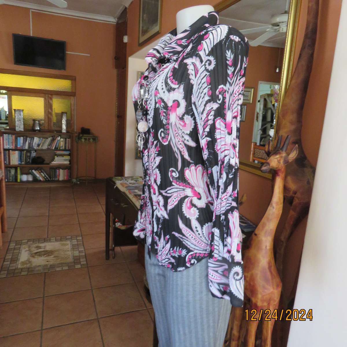 Permanent pleated black/pink/white bo-ho patterned button down long sleeve top. Size 40. Sheer poly.