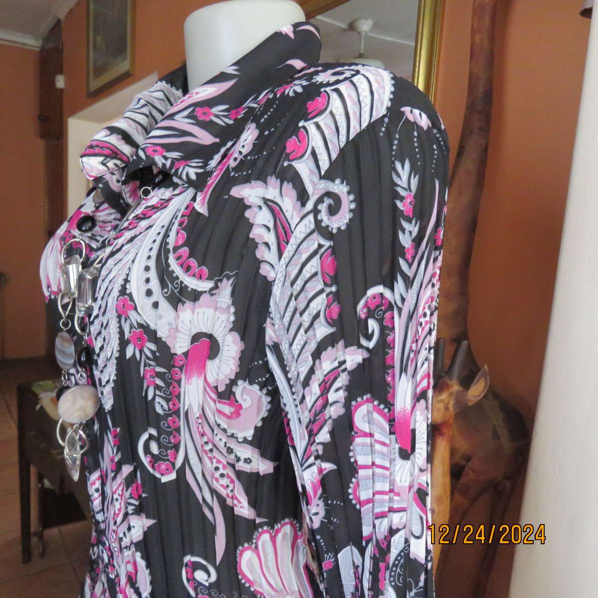 Permanent pleated black/pink/white bo-ho patterned button down long sleeve top. Size 40. Sheer poly.