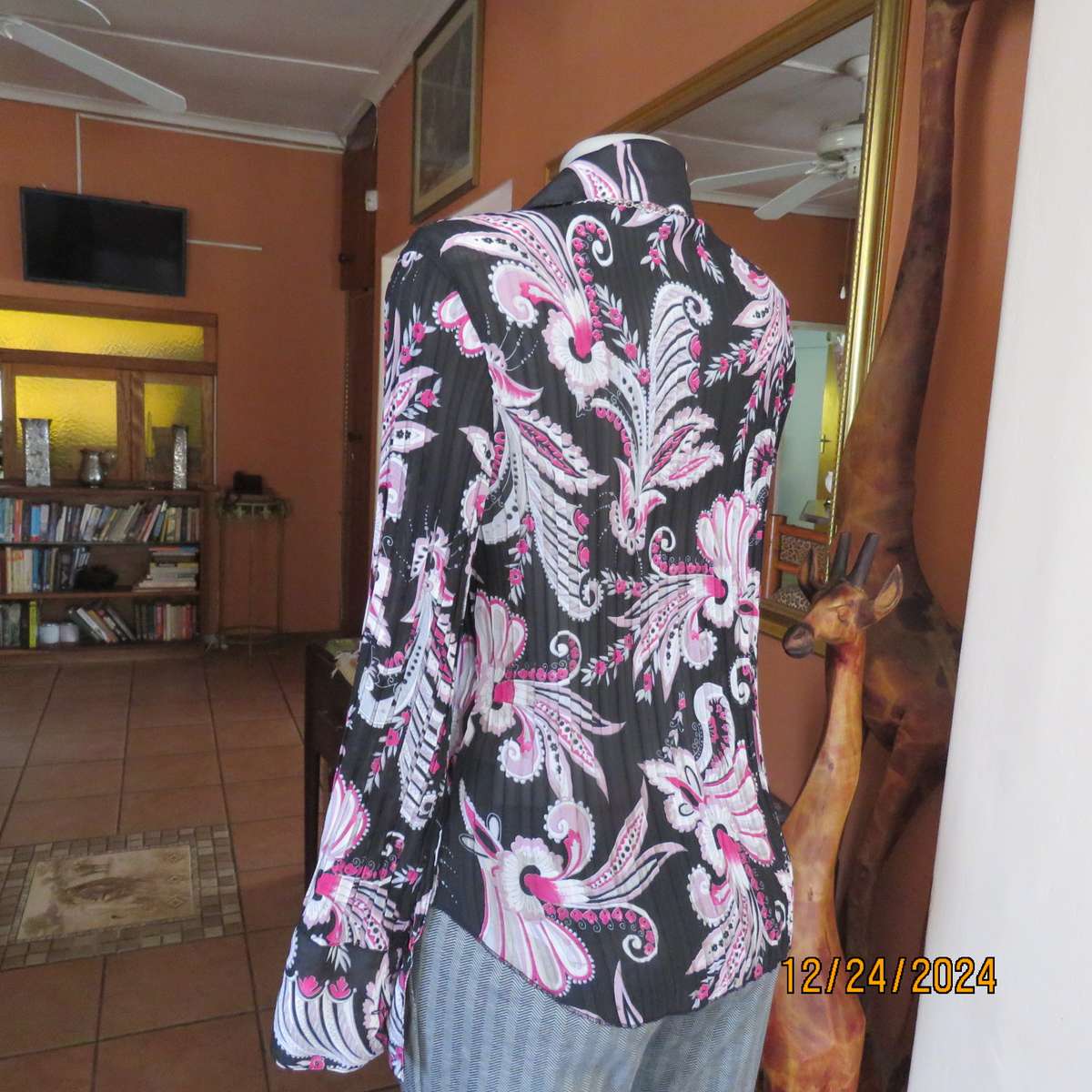 Permanent pleated black/pink/white bo-ho patterned button down long sleeve top. Size 40. Sheer poly.
