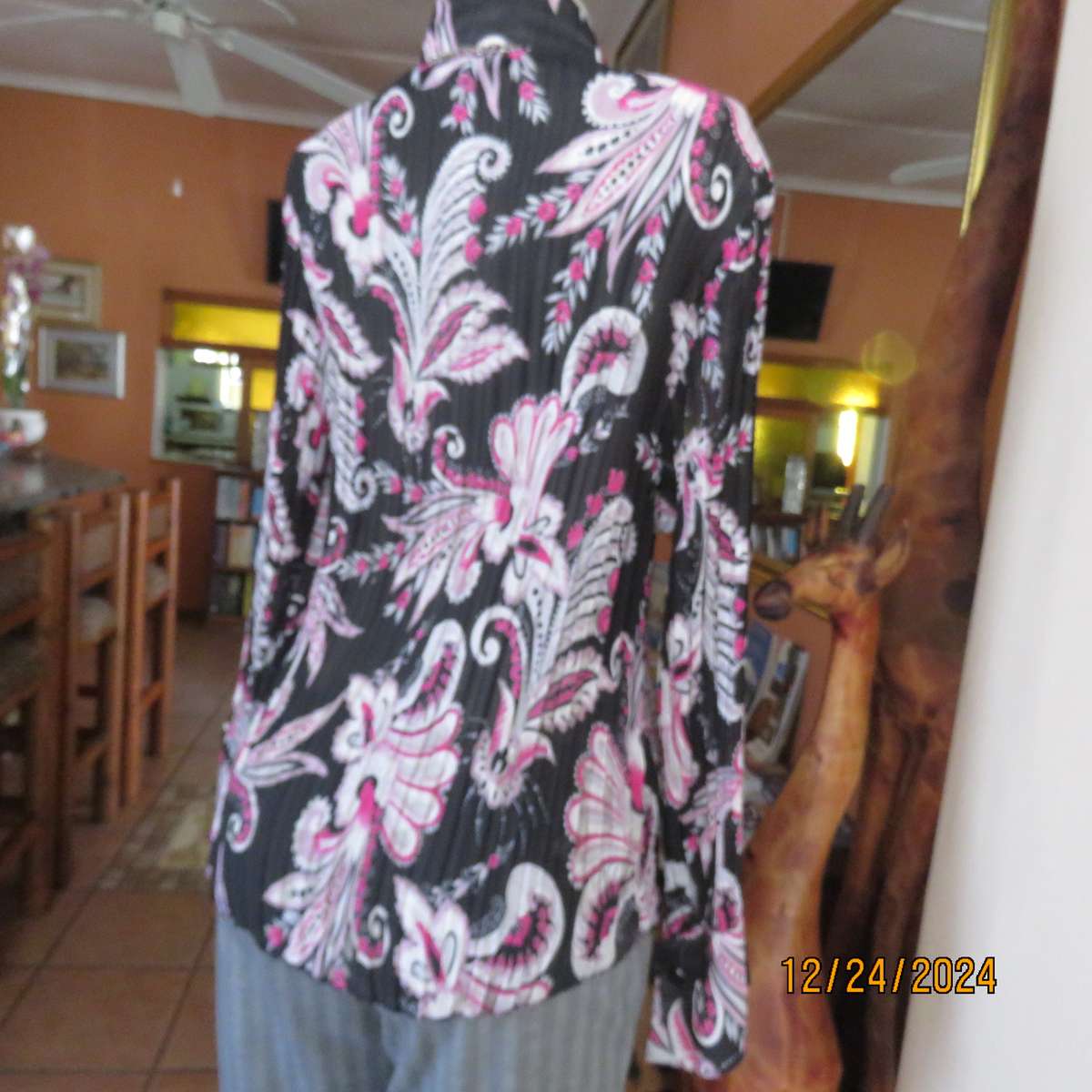 Permanent pleated black/pink/white bo-ho patterned button down long sleeve top. Size 40. Sheer poly.
