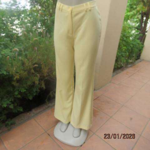 MILADYS banana yellow 2 pc suite. Bootlegged dress pants. Long lined jacket-coat. Size 37