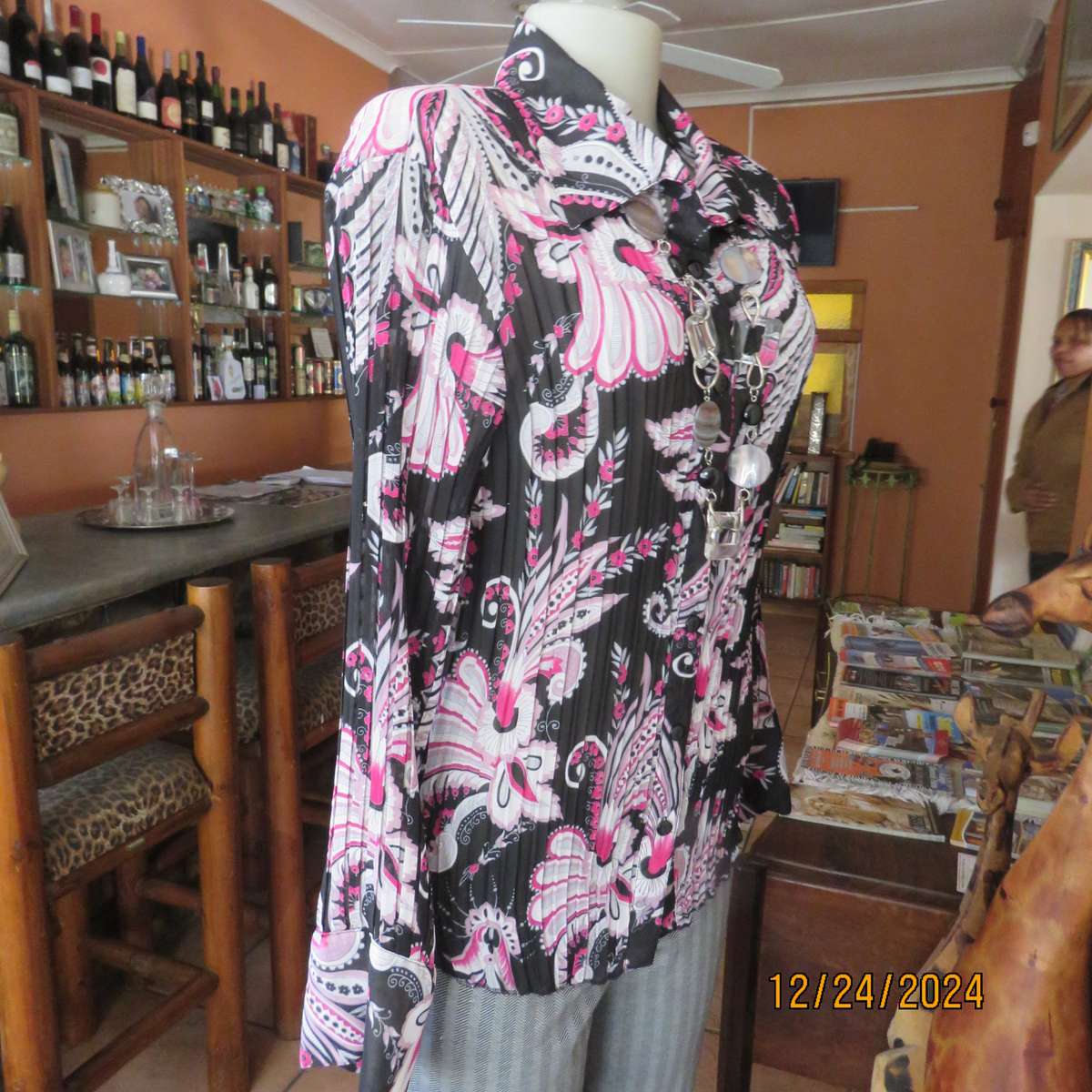 Permanent pleated black/pink/white bo-ho patterned button down long sleeve top. Size 40. Sheer poly.