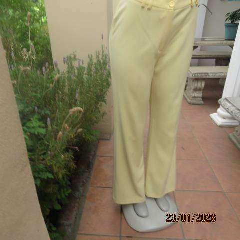 MILADYS banana yellow 2 pc suite. Bootlegged dress pants. Long lined jacket-coat. Size 37