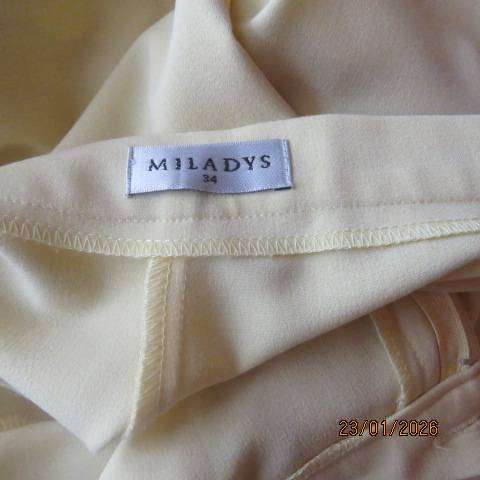 MILADYS banana yellow 2 pc suite. Bootlegged dress pants. Long lined jacket-coat. Size 37