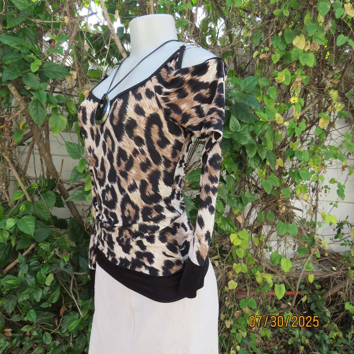 INWEAR animal print long sleeve naked shoulder and chrome link top size 32.