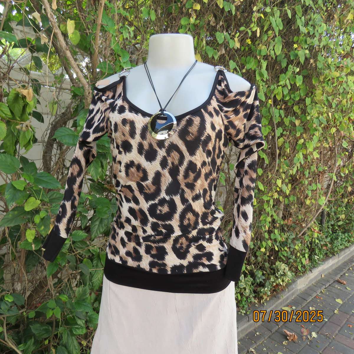 INWEAR animal print long sleeve naked shoulder and chrome link top size 32.