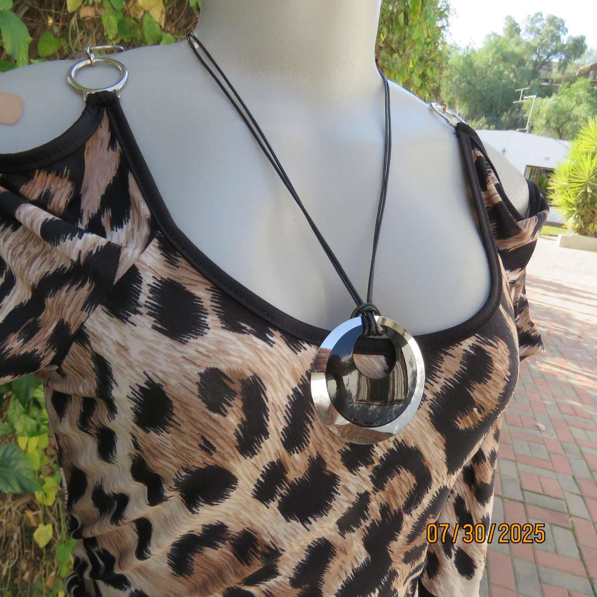 INWEAR animal print long sleeve naked shoulder and chrome link top size 32.