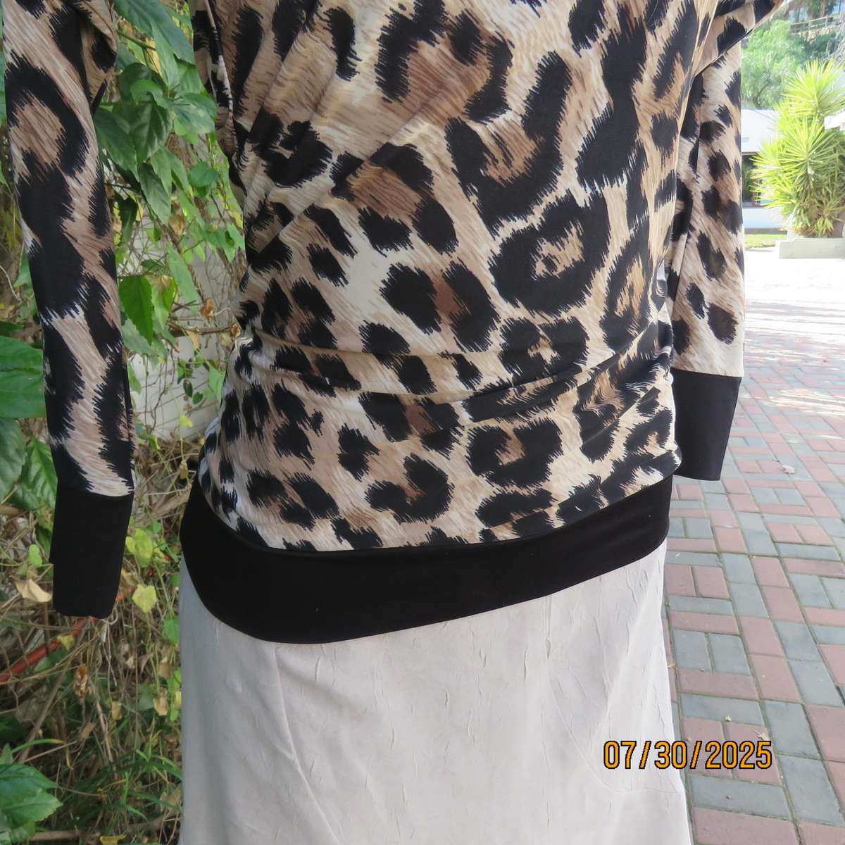 INWEAR animal print long sleeve naked shoulder and chrome link top size 32.