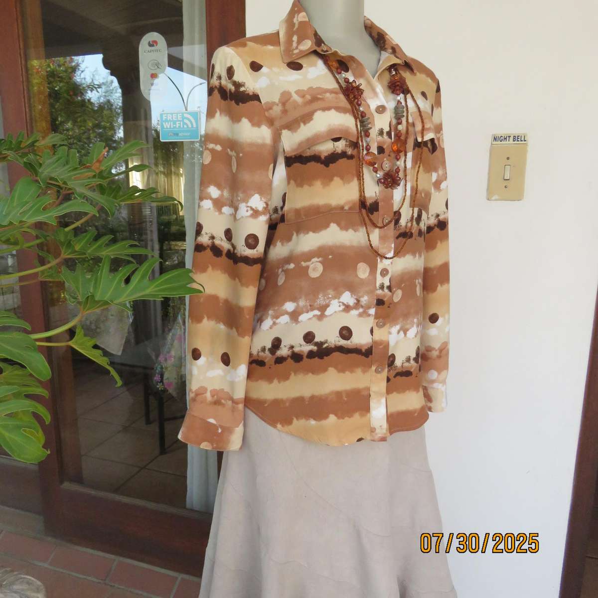 WOOLWORTHS button down horizontal pattern long sleeve viscose top in size 34.