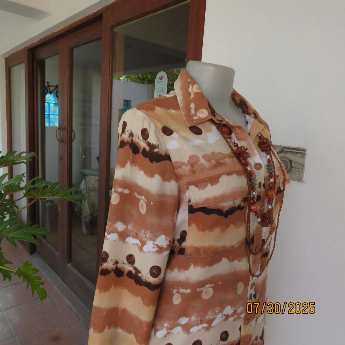 WOOLWORTHS button down horizontal pattern long sleeve viscose top in size 34.