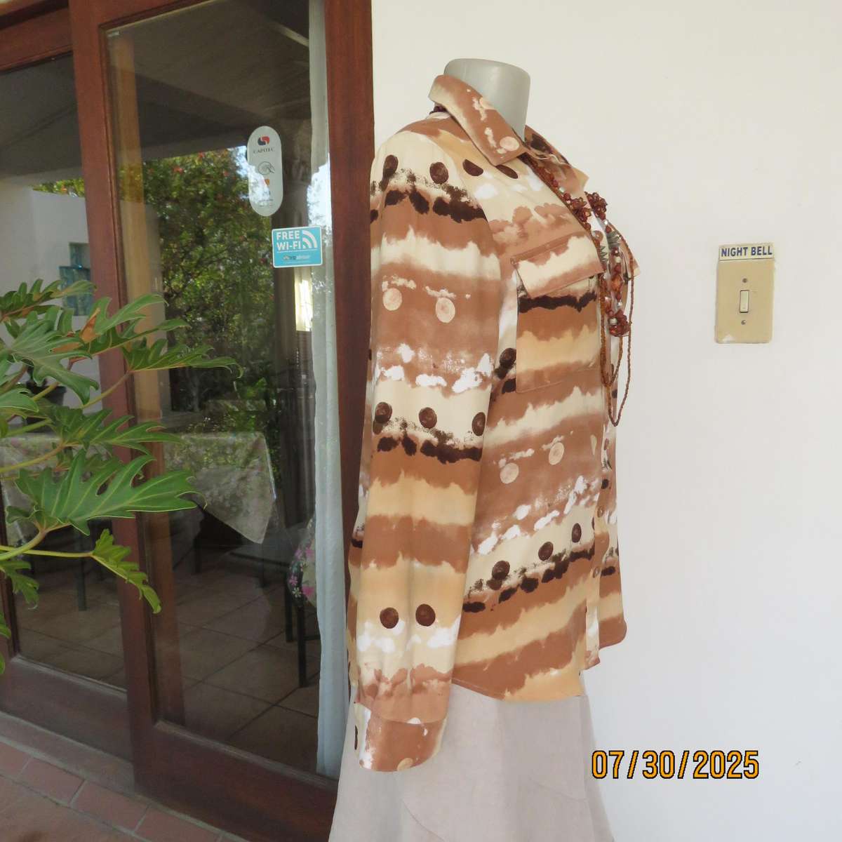 WOOLWORTHS button down horizontal pattern long sleeve viscose top in size 34.