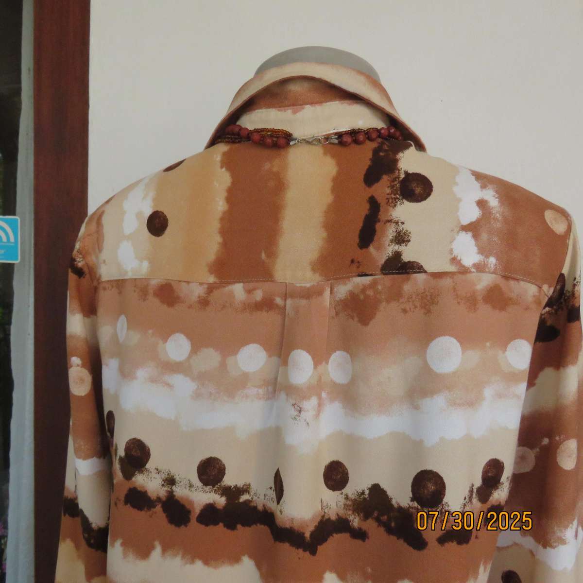 WOOLWORTHS button down horizontal pattern long sleeve viscose top in size 34.