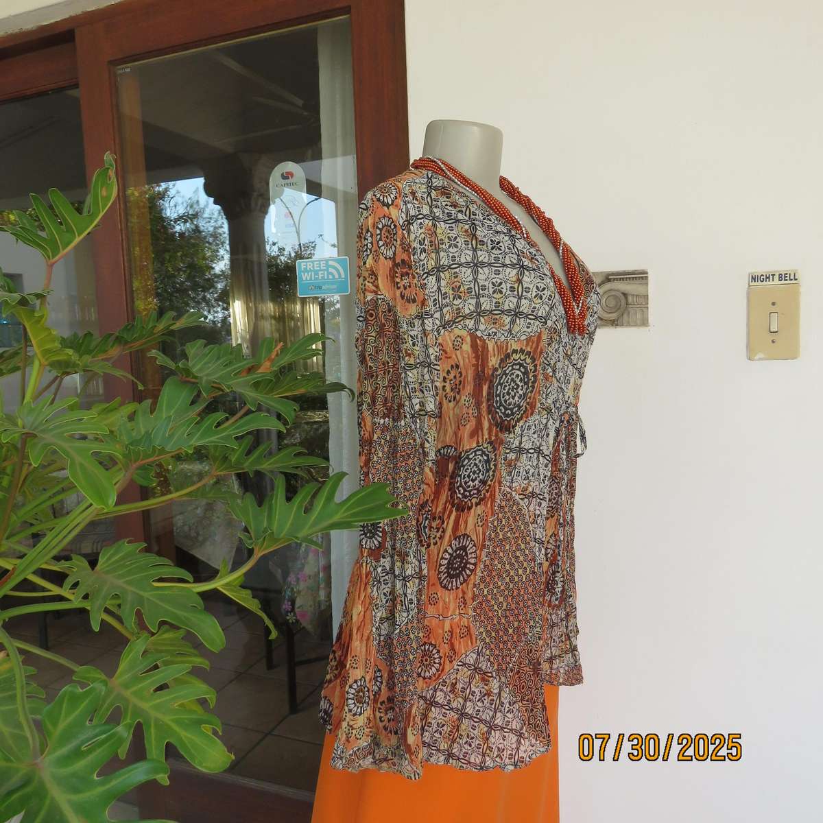 Autumn colour permanent creased size 44 long sleeve empire style top.