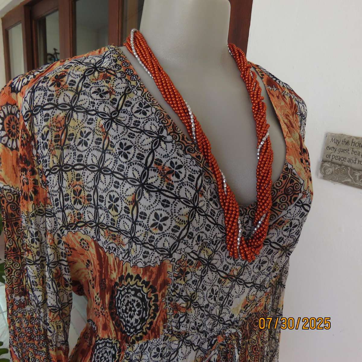 Autumn colour permanent creased size 44 long sleeve empire style top.