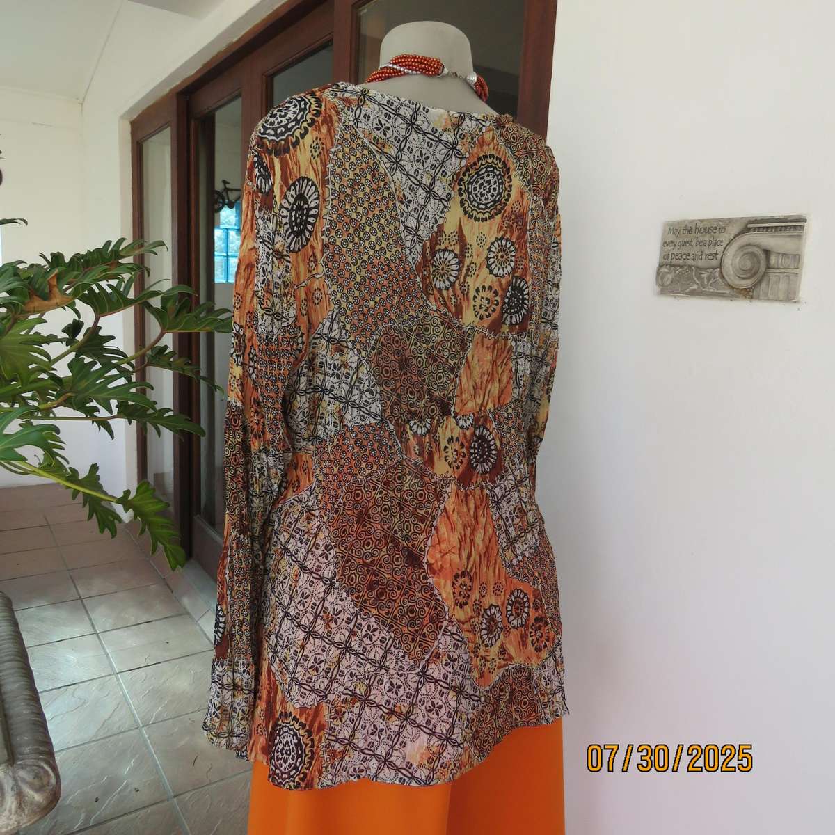 Autumn colour permanent creased size 44 long sleeve empire style top.