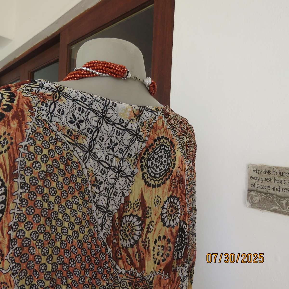 Autumn colour permanent creased size 44 long sleeve empire style top.