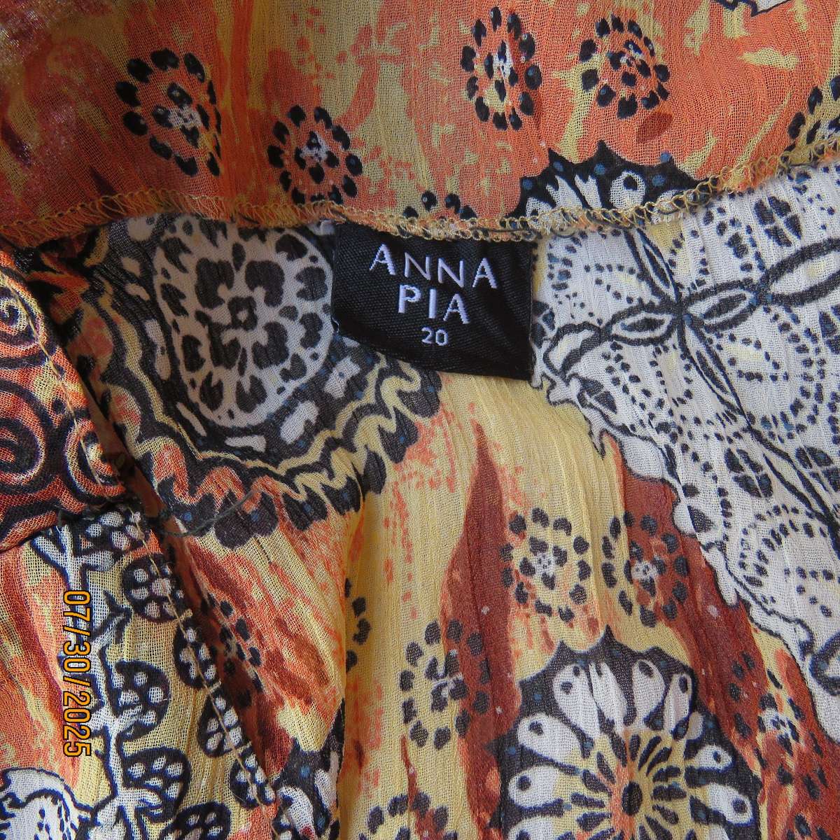 Autumn colour permanent creased size 44 long sleeve empire style top.