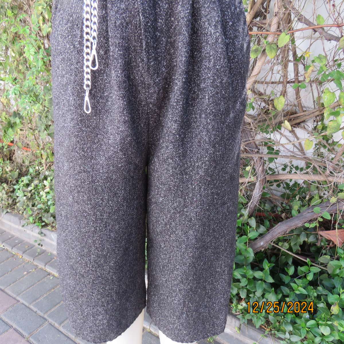 Winter calf length pantsuit in woolen/poly salt/pepper colour fabric. Size 34 by AIMEE.Partly lined.