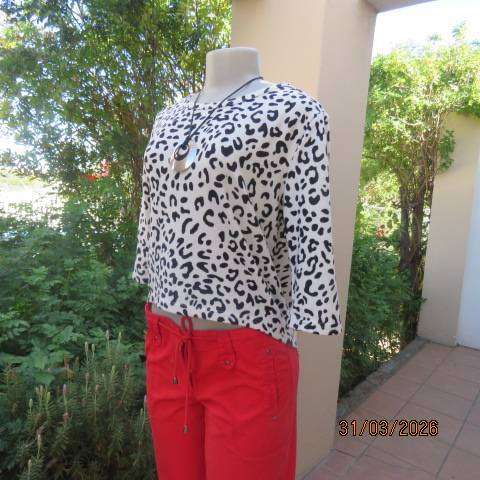 Animal print black and white slip-over top for women, size 36-38, polyester stretch knit
