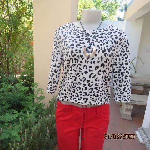 Animal print black and white slip-over top for women, size 36-38, polyester stretch knit