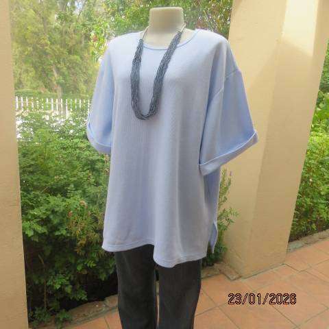 Misty blue slip over ribbed polycotton top with short sleeves with turnovers. Size 48