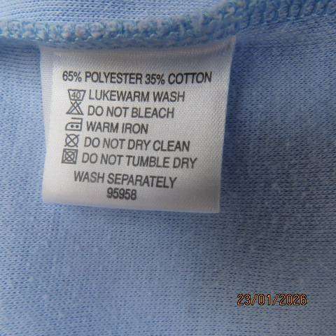 Misty blue slip over ribbed polycotton top with short sleeves with turnovers. Size 48