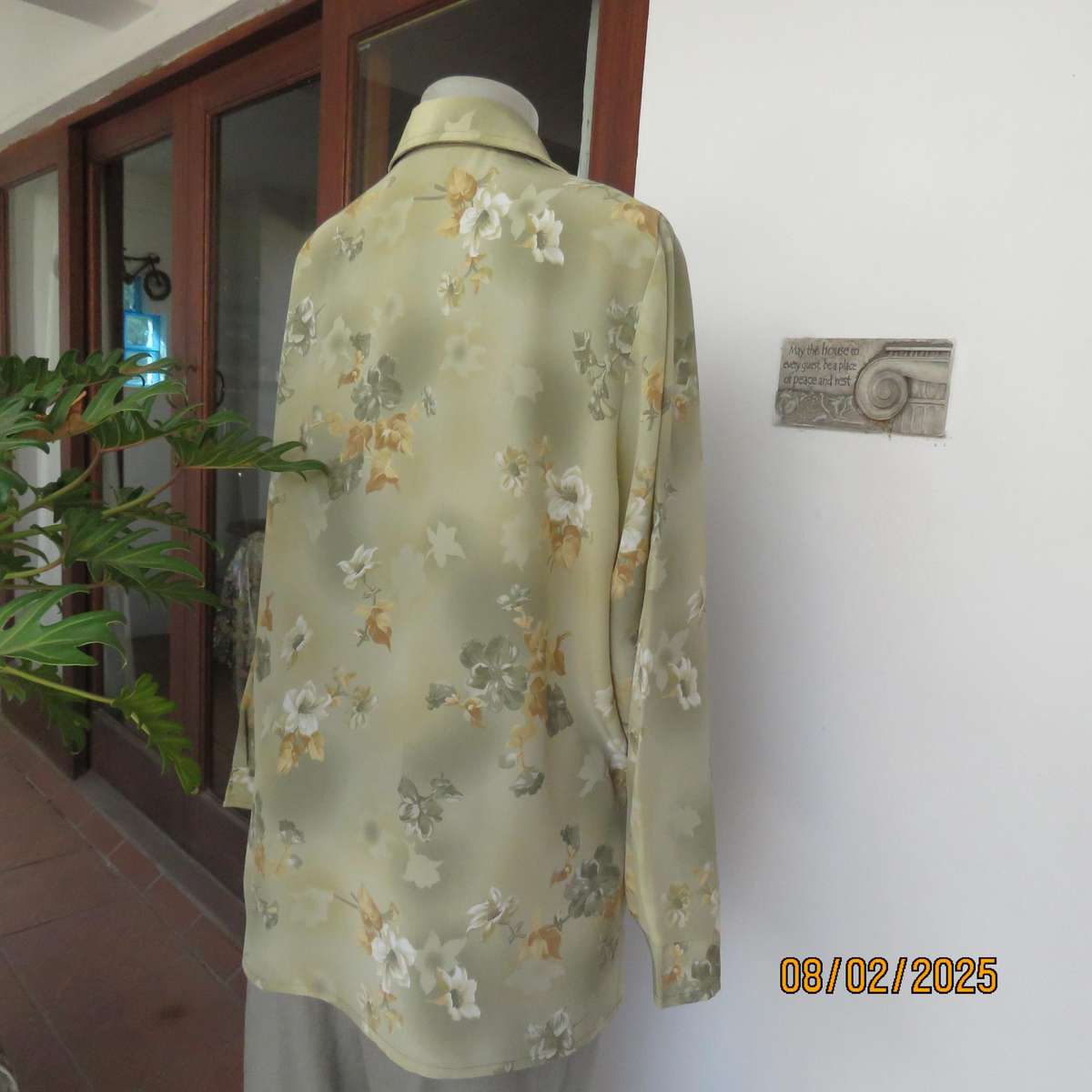 Moss green textured polyester long sleeve top with green-gold flowers. Size 44
