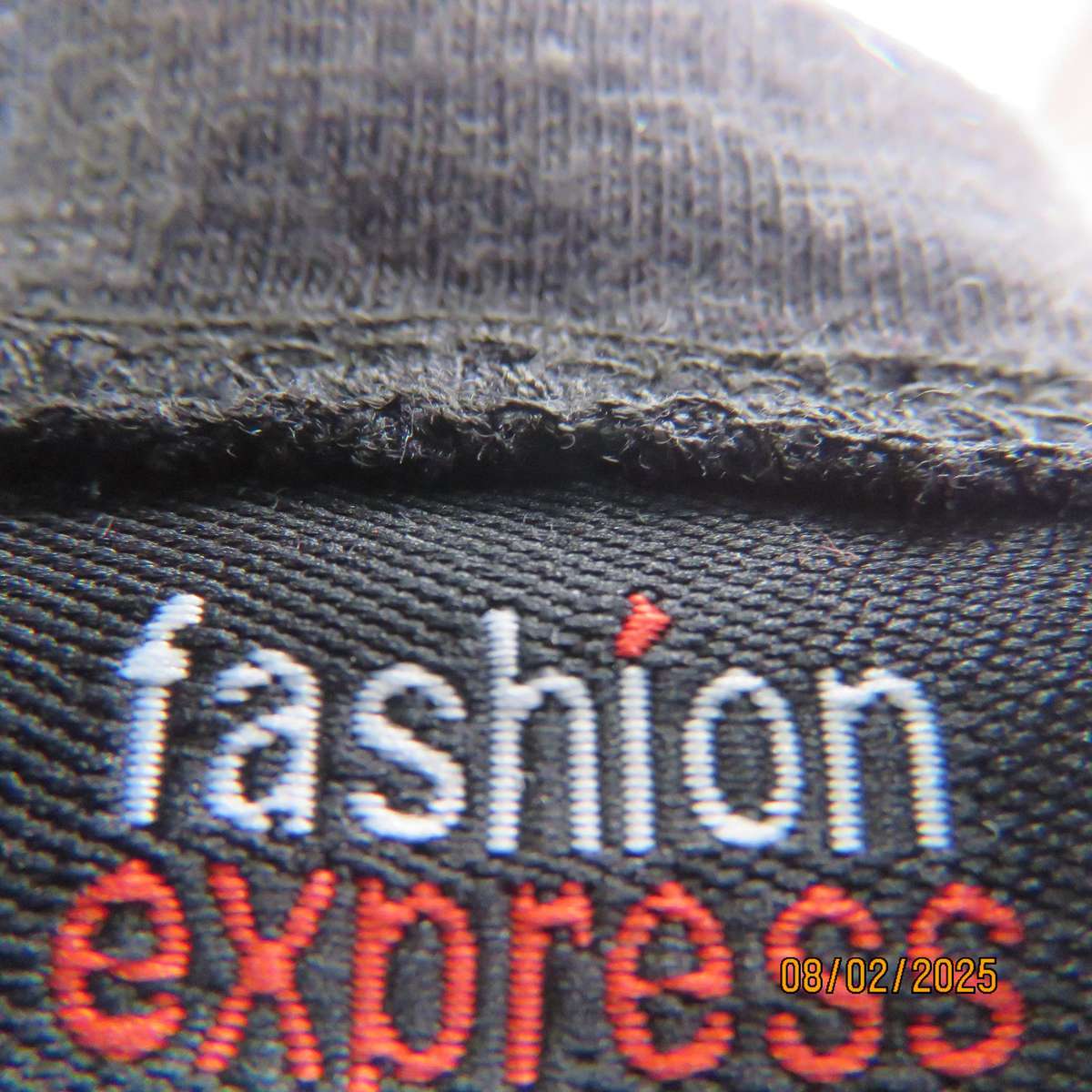 FASHION EXPRESS very black slip over V fringed front top size 38.