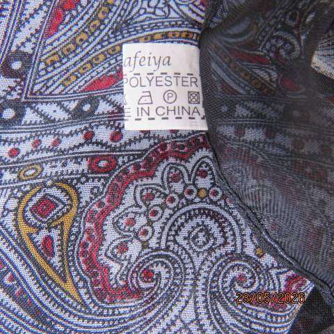 Black sheer polyester throw-over top with white, grey & red baroque print