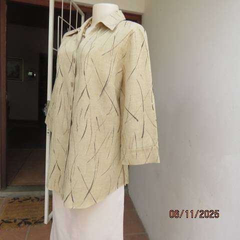 Rich cream textured polyester button down top with brown print. Size 38-40
