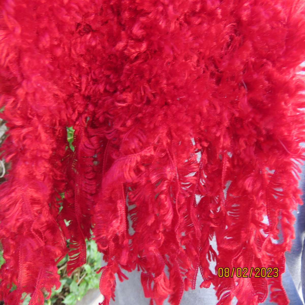 Red fluffy acrylic long narrow scarf. Length 2m x 16cm. As new