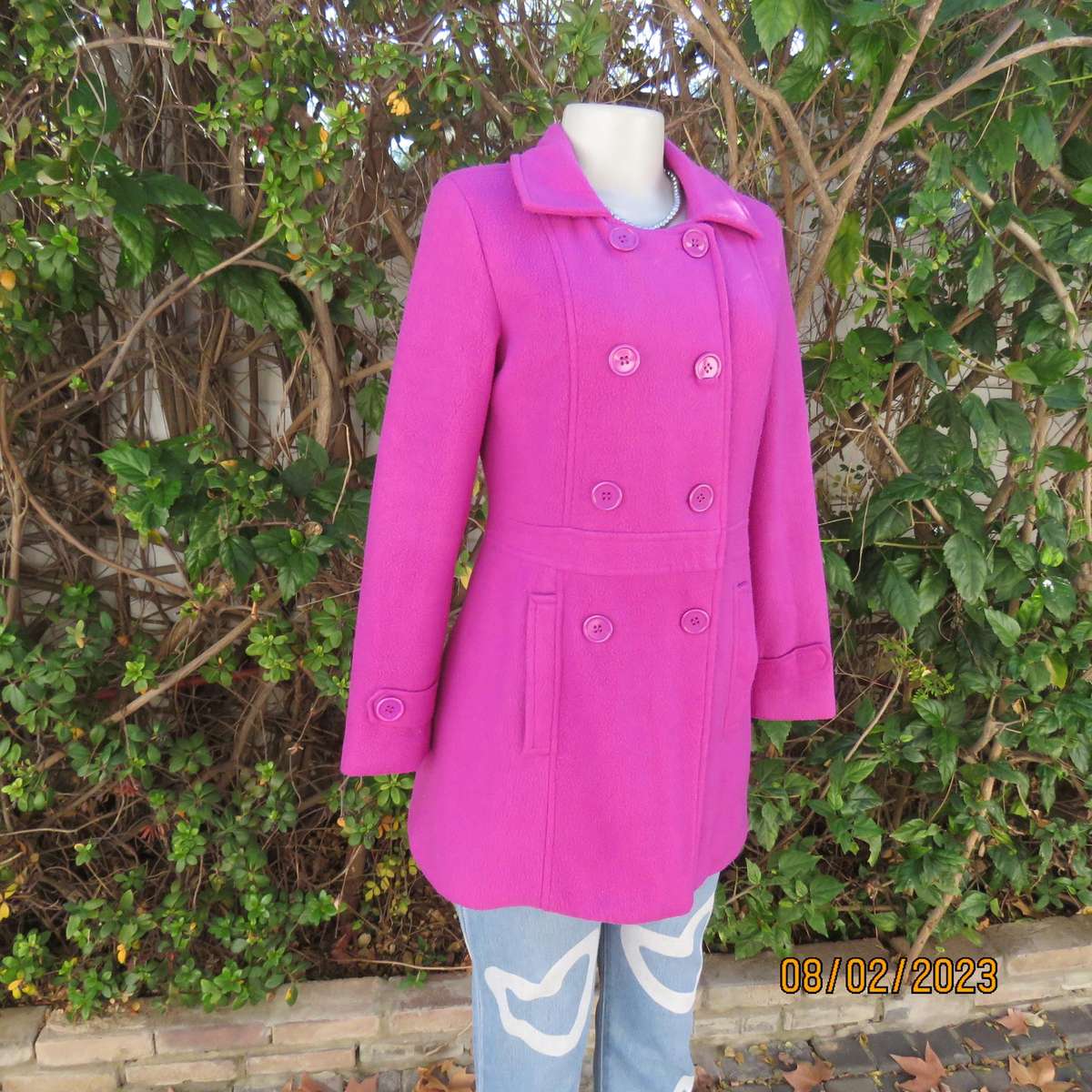 Magenta pink long size 34 warm jacket with double breast look.