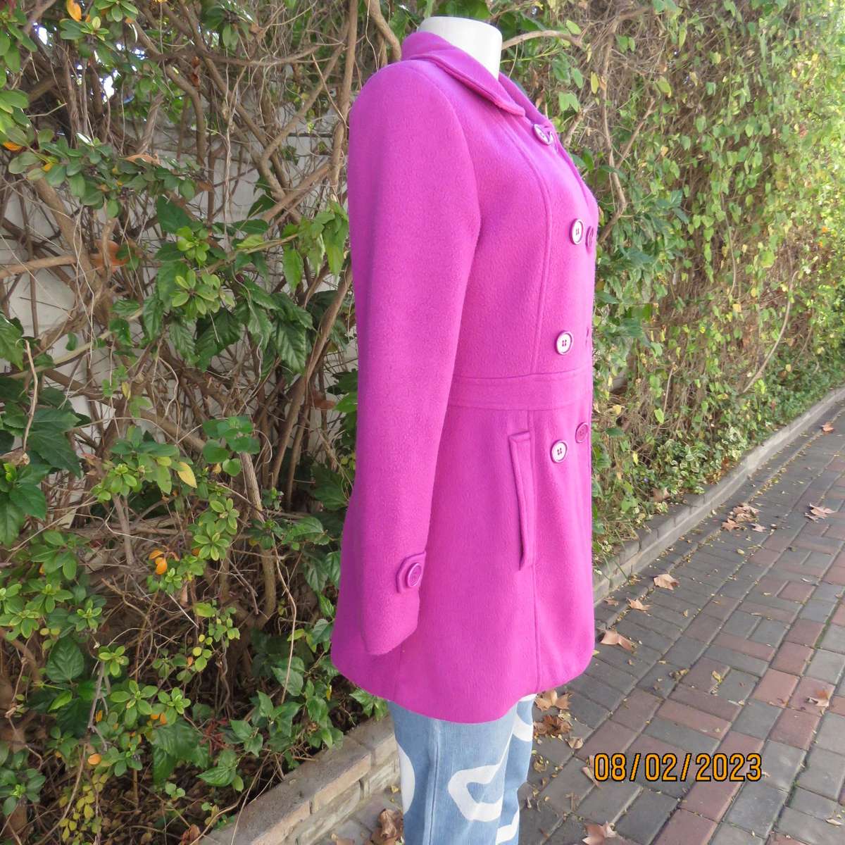 Magenta pink long size 34 warm jacket with double breast look.
