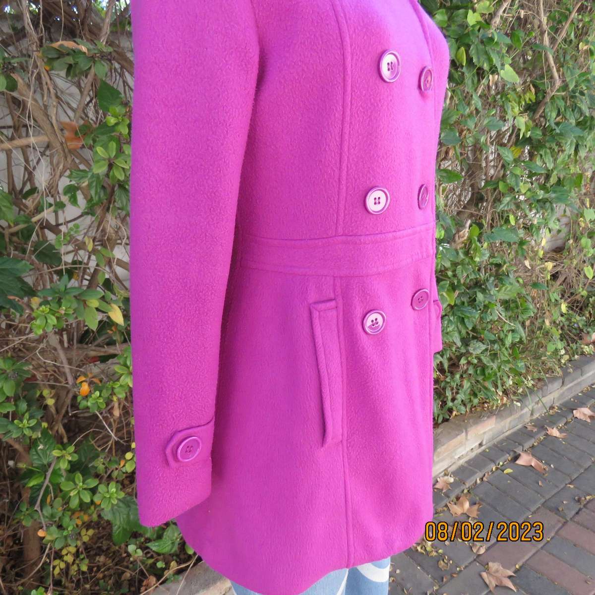Magenta pink long size 34 warm jacket with double breast look.