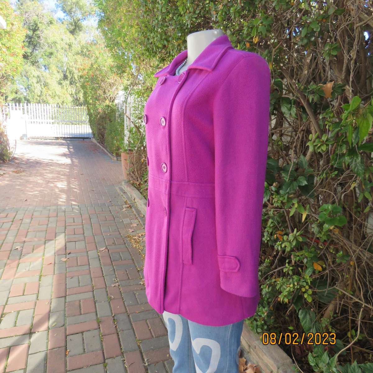 Magenta pink long size 34 warm jacket with double breast look.