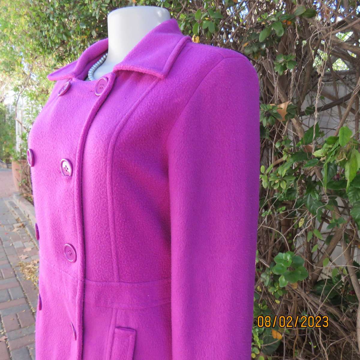 Magenta pink long size 34 warm jacket with double breast look.