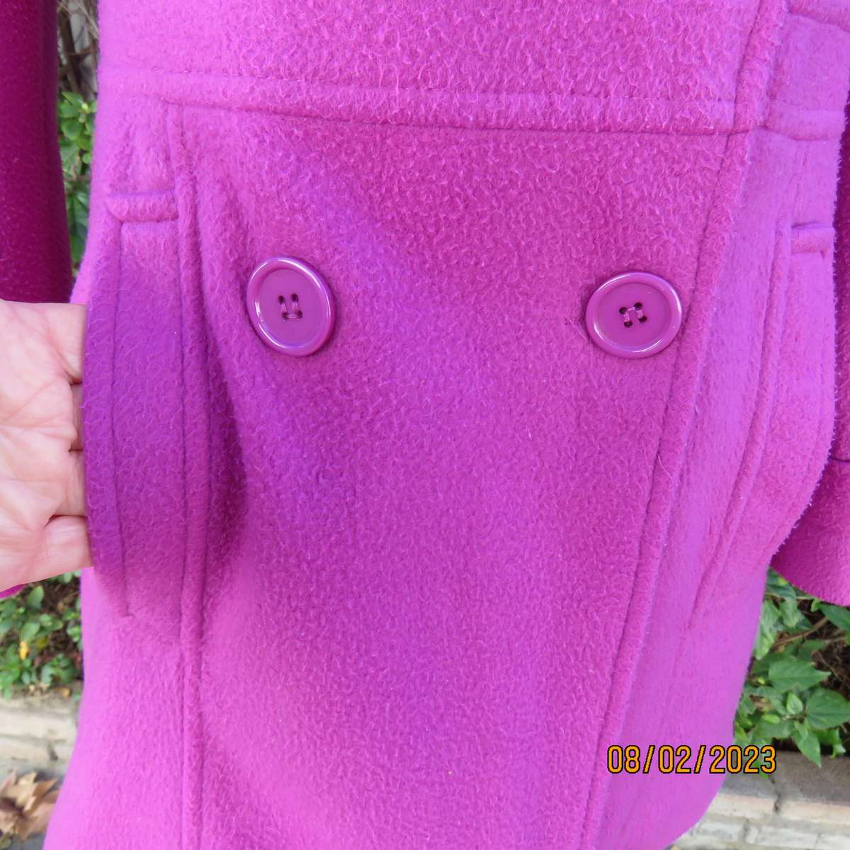 Magenta pink long size 34 warm jacket with double breast look.
