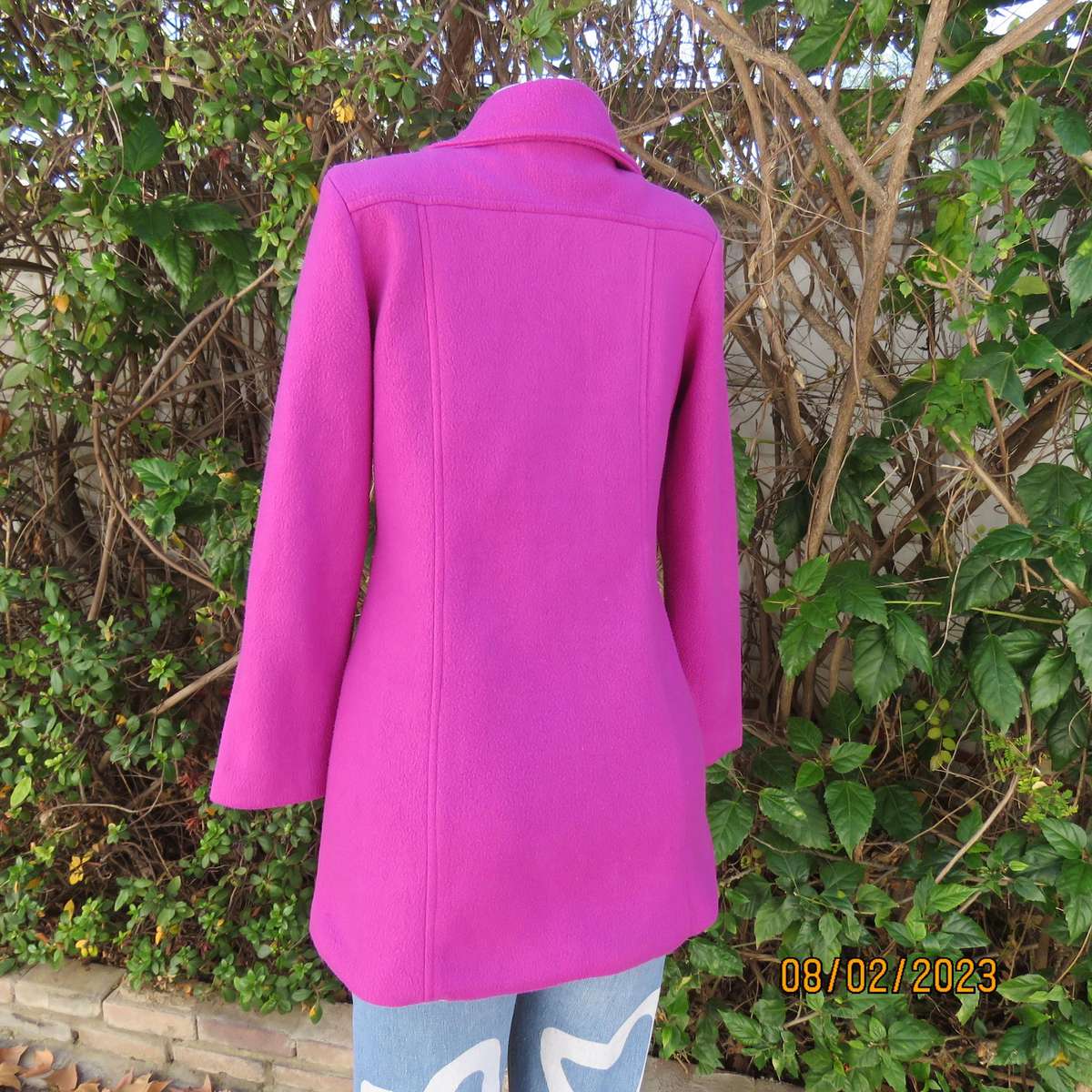Magenta pink long size 34 warm jacket with double breast look.