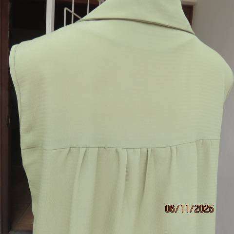Avo green long button down textured polyester top with collar and yokes. Size 42