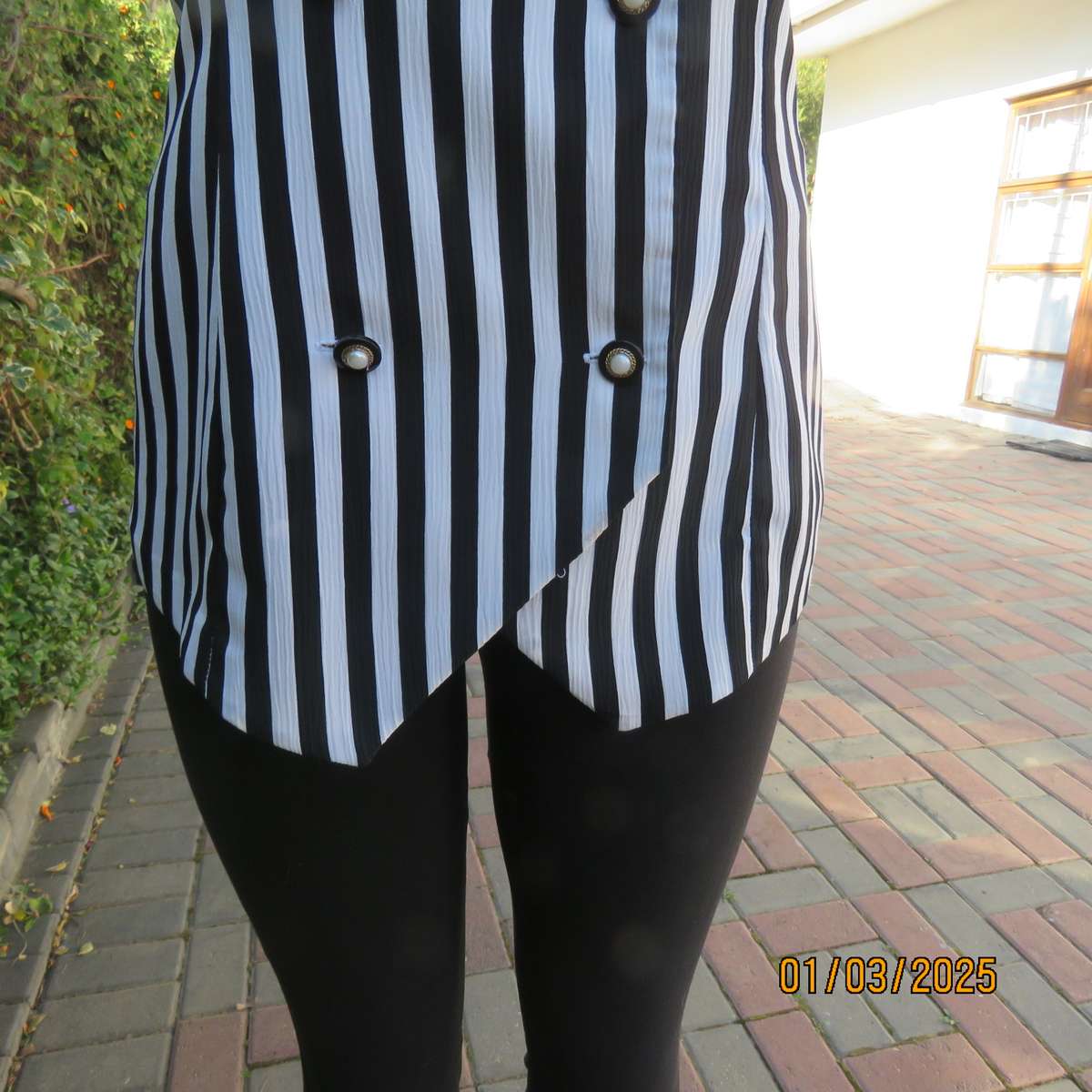 Smart waistcoat style black/white vertical striped crinkled polyester top. Size 38. Double breasted.