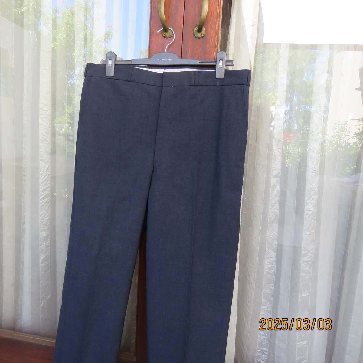 As new dark blue straight legged dress pants size 38 by ENSIGN Clothing. Side pockets. 1 at back.