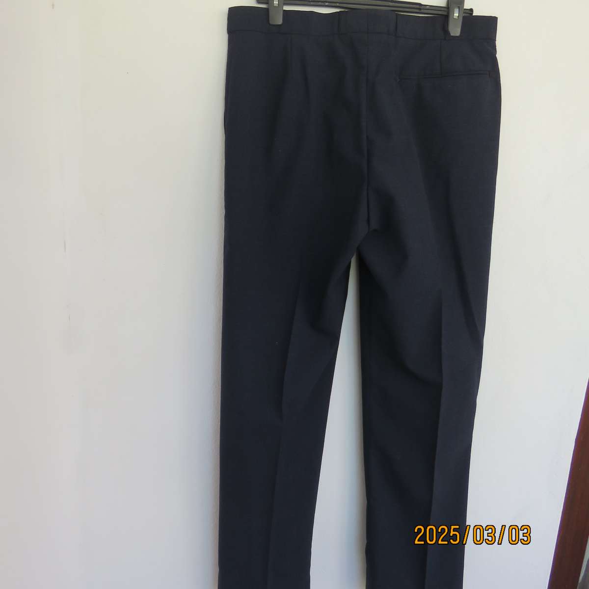 As new dark blue straight legged dress pants size 38 by ENSIGN Clothing. Side pockets. 1 at back.