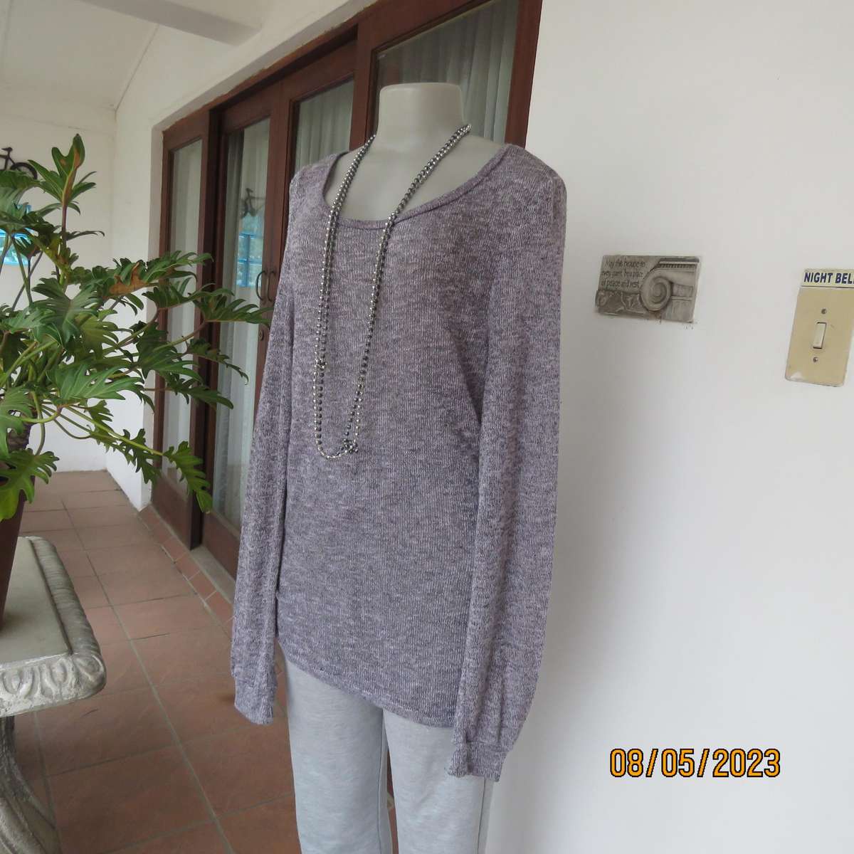 Soft pink-grey mottled extra long polyester-rayon knitted top. Size 38.