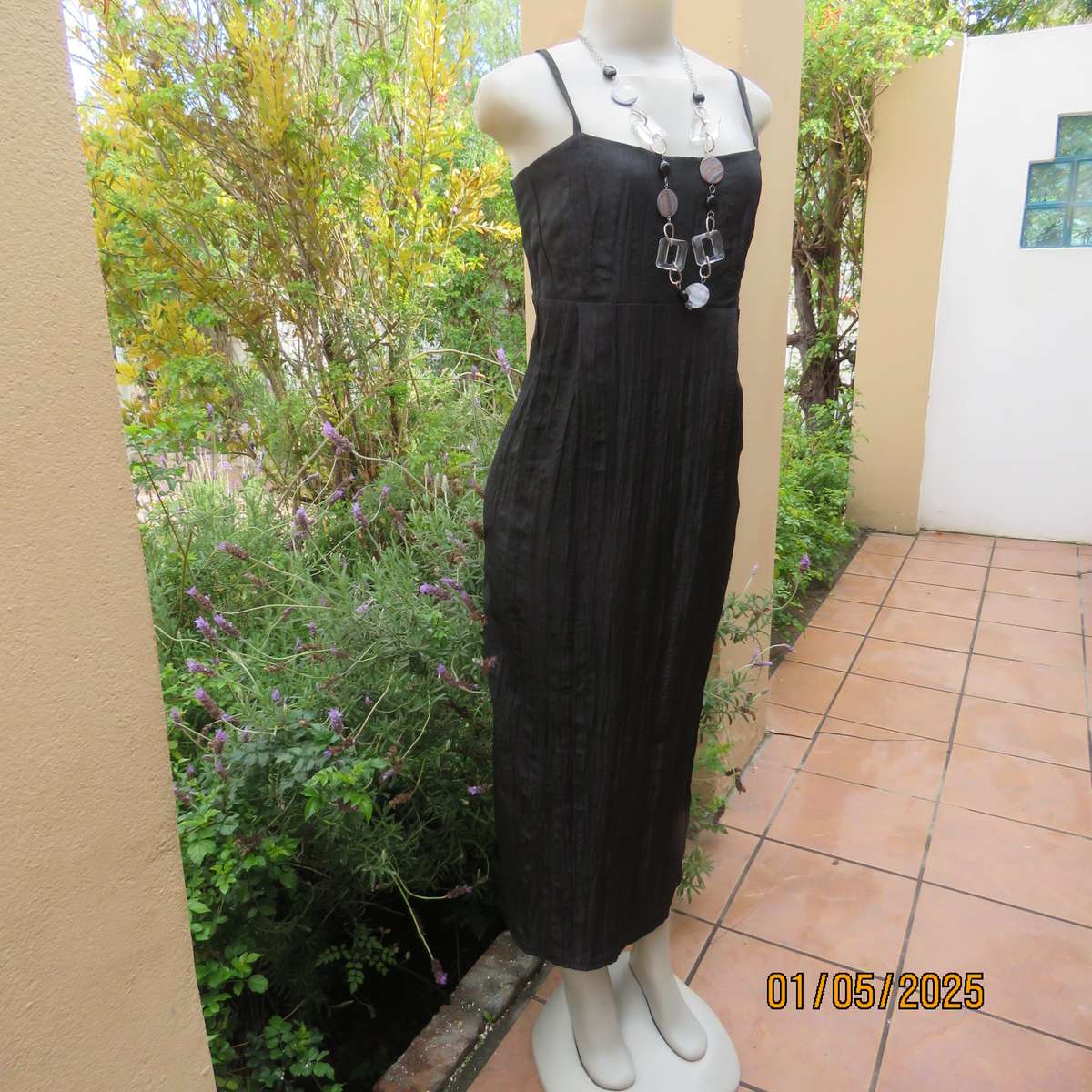 Stunning ankle length black crinkled polyester strappy dress in empire style. Size 34. As new