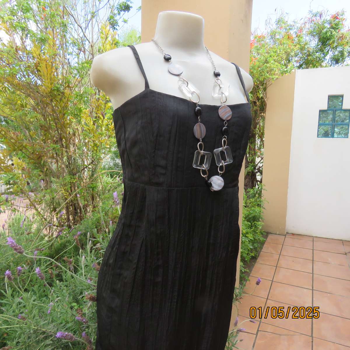 Stunning ankle length black crinkled polyester strappy dress in empire style. Size 34. As new