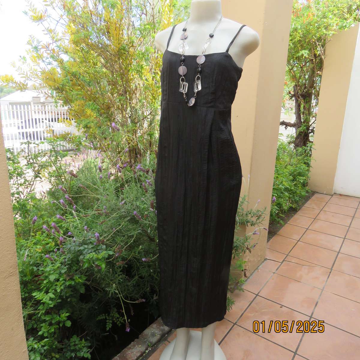 Stunning ankle length black crinkled polyester strappy dress in empire style. Size 34. As new