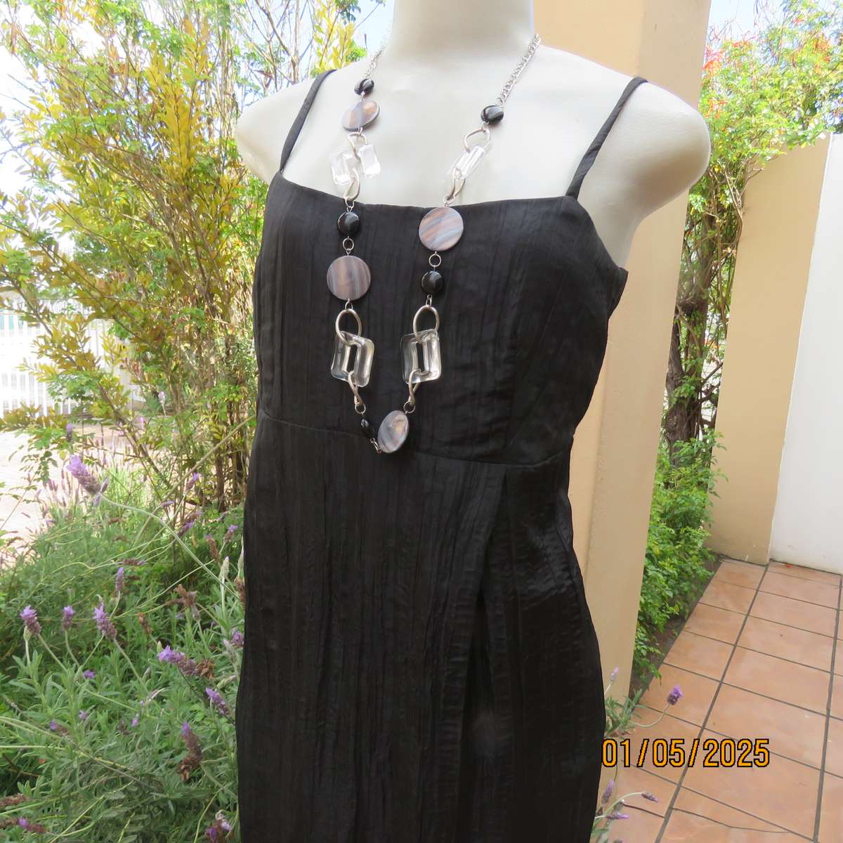 Stunning ankle length black crinkled polyester strappy dress in empire style. Size 34. As new