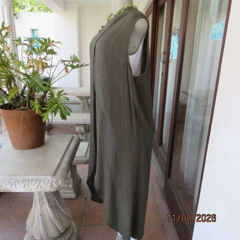 Olive green sleeveless ankle-length high neck top with cross-over front in size 38-40